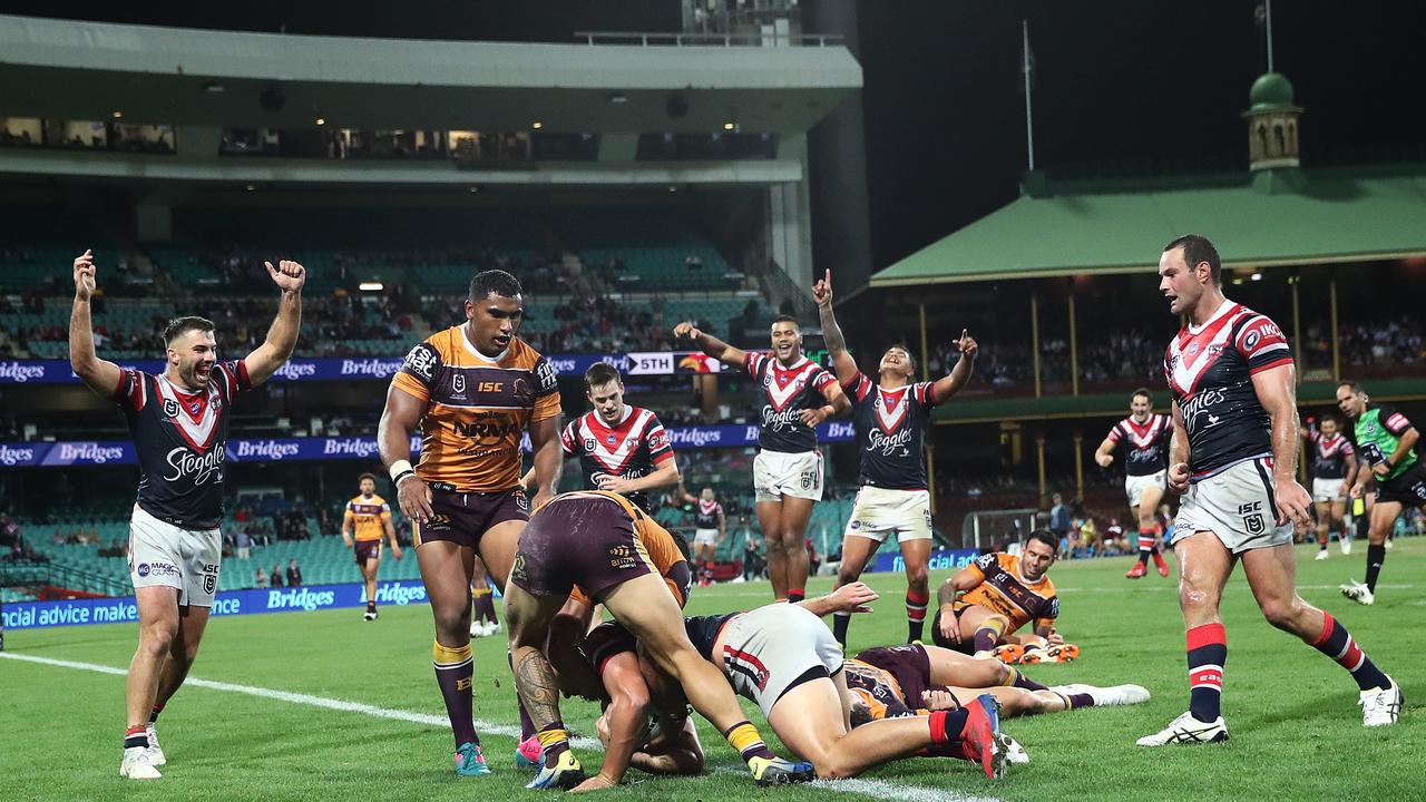 The Roosters celebrate Joseph Manu try during NRL match Sydney Roosters v Brisbane Broncos at the SCG. Picture. Phil Hillyard