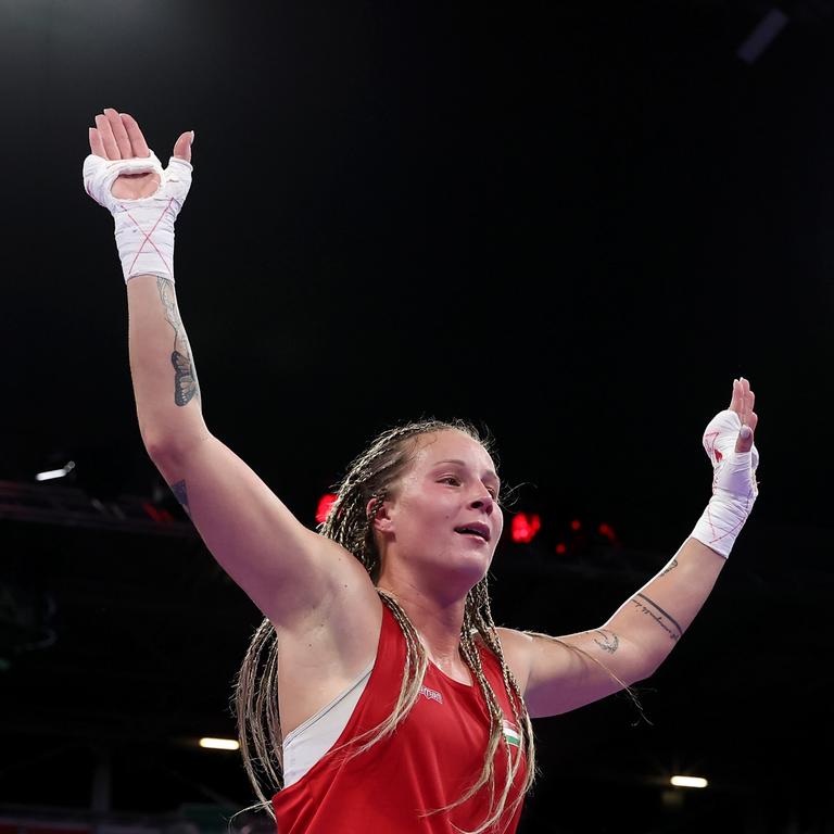 Anna Luca Hamori celebrates after defeating Australia’s Marissa Williamson in her first bout. (Photo by Richard Pelham/Getty Images)