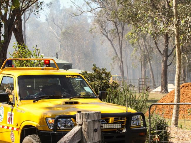 Emergency services respond to a bushfire at Moore Park Beach.