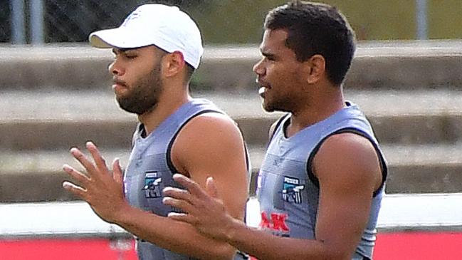 Jarman Impey and teammate Jake Neade at Port Adelaide’s closed training session at Alberton Oval. Picture: Mark Brake