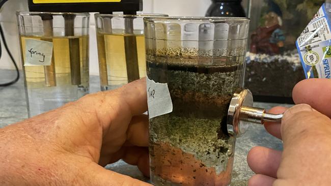 Dubbo tap water's sediment being attracted to a regular fridge magnet.