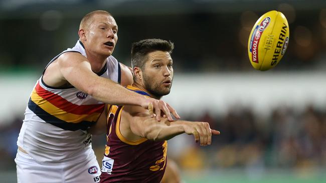 Sam Jacobs of the Crows competes with Stefan Martin of the Lions. Picture: AAP Image/Jono Searle