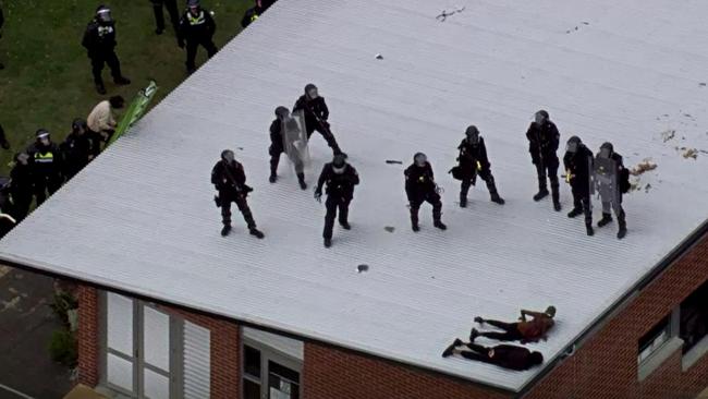 Police with riot gear enter the Banksia Hill Juvenile Detention Centre as detainees begin to surrender following a riot in May. Picture: ABC