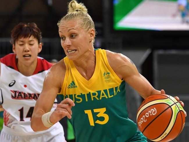 Australia's shooting guard Erin Phillips dribbles during a Women's round Group A basketball match between Japan and Australia at the Youth Arena in Rio de Janeiro on August 11, 2016 during the Rio 2016 Olympic Games. / AFP PHOTO / Andrej ISAKOVIC