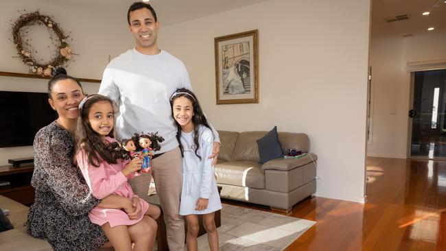 Ash and Narin Rodrigues, and their daughters Myra and Aida, in their Doncaster East home. Picture: Jason Edwards