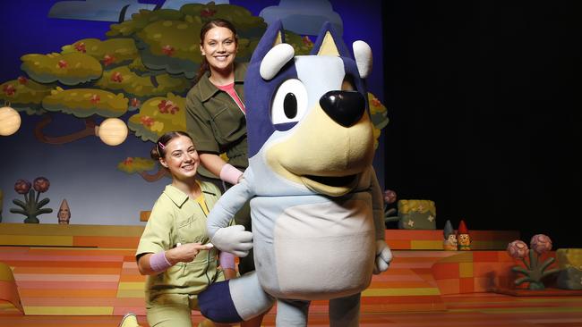 Puppeteers Joanna Halliday and Jessa Koncic with Bluey. Picture: Josh Woning