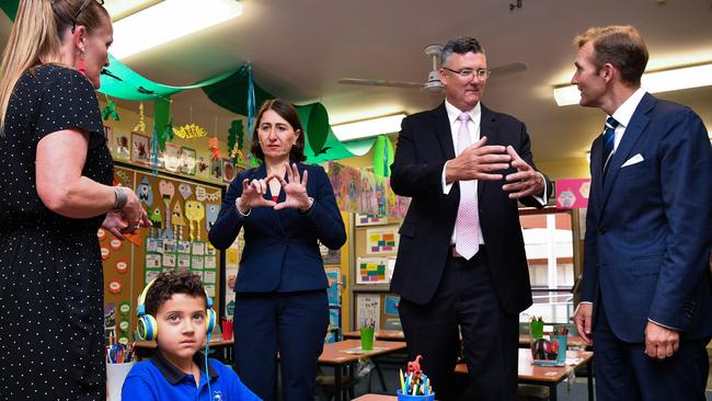 Ms Berejiklian, Mark Taylor member for Seven Hills and Mr Stokes chat at Seven Hills North Public School.