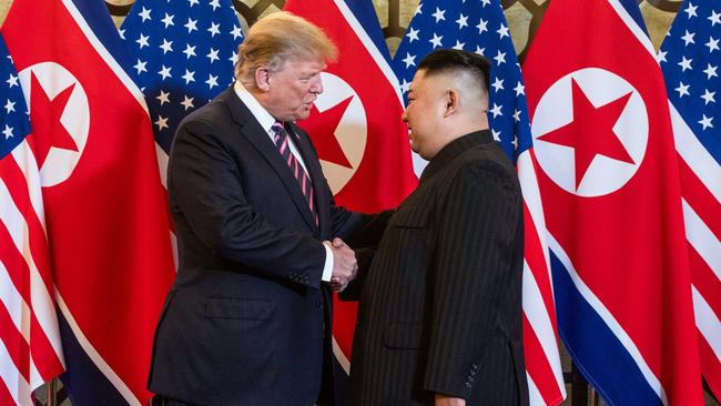 Former US President Donald Trump shaking hands with North Korea's leader Kim Jong Un before a meeting at the Sofitel Legend Metropole hotel in Hanoi. Picture: Saul Loeb/AFP