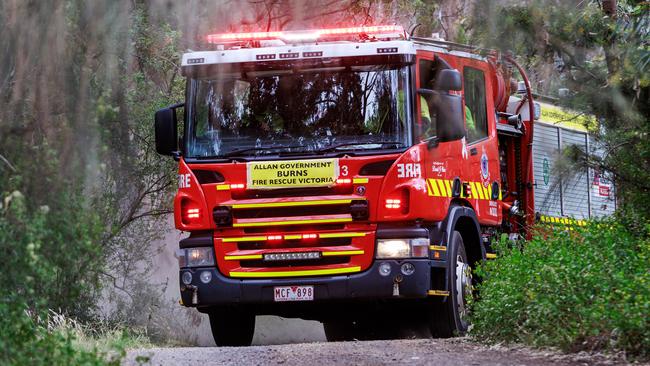 MELBOURNE, AUSTRALIA - Newswire Photos December 16, 2024: Firemen attending a small grass fire below the Westgate Bridge in Melbourne.. Picture: NewsWire / Aaron Francis