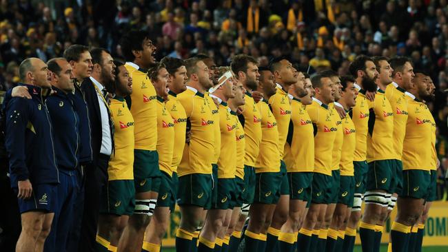The Wallabies sing the National Anthem.