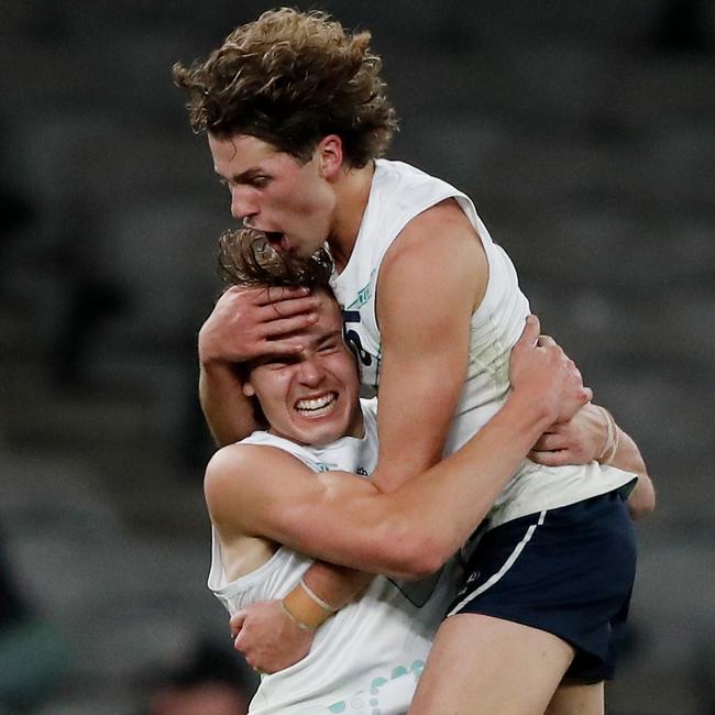 Aaron Cadman and Jhye Clark celebrate a goal with Vic Country.