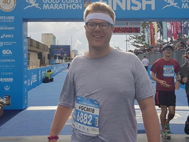 Gold Coast Bulletin journalist Alister Thomson successfully finishes the Gold Coast Marathon. Photo: Tanya Westthorp