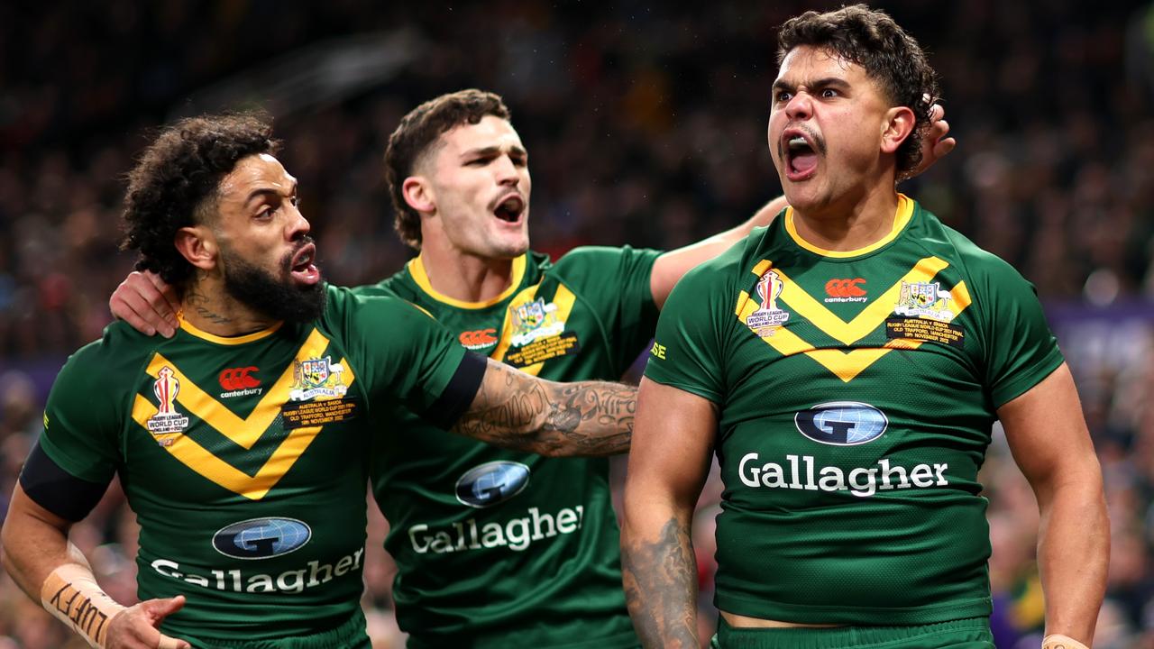 MANCHESTER, ENGLAND - NOVEMBER 19: Latrell Mitchell of Australia celebrates their sides first try with teammates during the Rugby League World Cup Final match between Australia and Samoa at Old Trafford on November 19, 2022 in Manchester, England. (Photo by Naomi Baker/Getty Images)