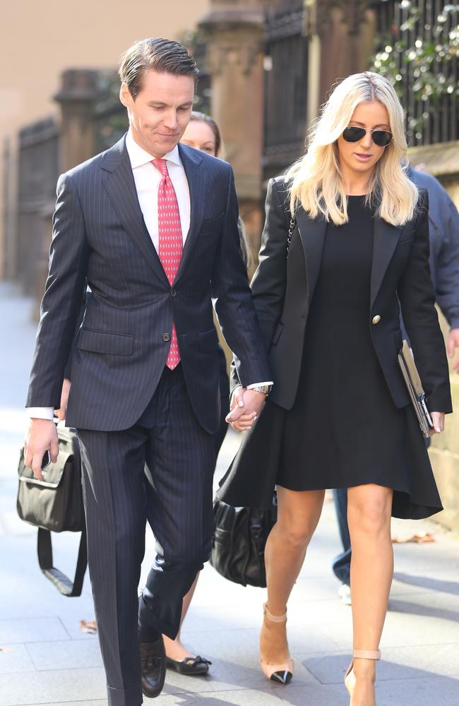 Oliver Curtis and wife Roxy Jacenko arrive at the Supreme Court in Sydney to wait for the jury's verdict in his trial. Picture: John Grainger