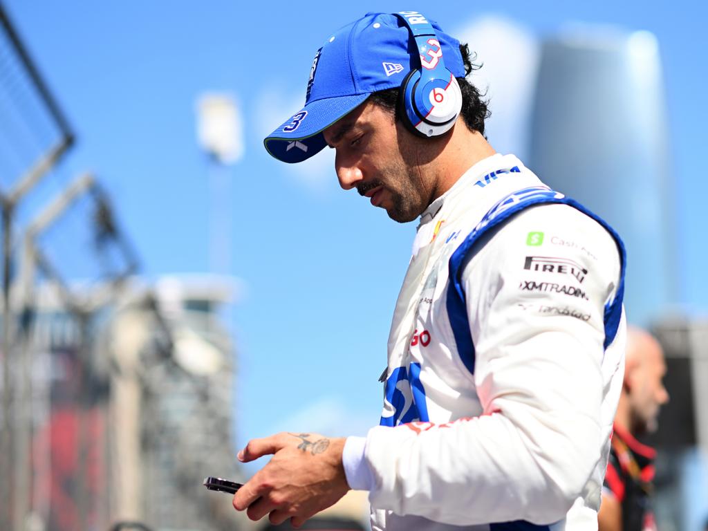 BAKU, AZERBAIJAN – SEPTEMBER 15: Daniel Ricciardo of Australia and Visa Cash App RB looks on, on the grid during the F1 Grand Prix of Azerbaijan at Baku City Circuit on September 15, 2024 in Baku, Azerbaijan. (Photo by Rudy Carezzevoli/Getty Images)