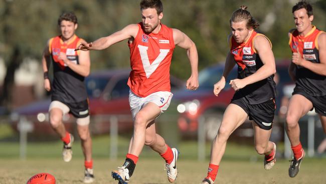 Southern football league finals: Dingley v East Brighton at Newcomen Road reserve, Springvale. Vampires forward Toby Mahoney leads the race for the ball. Picture:Chris Eastman