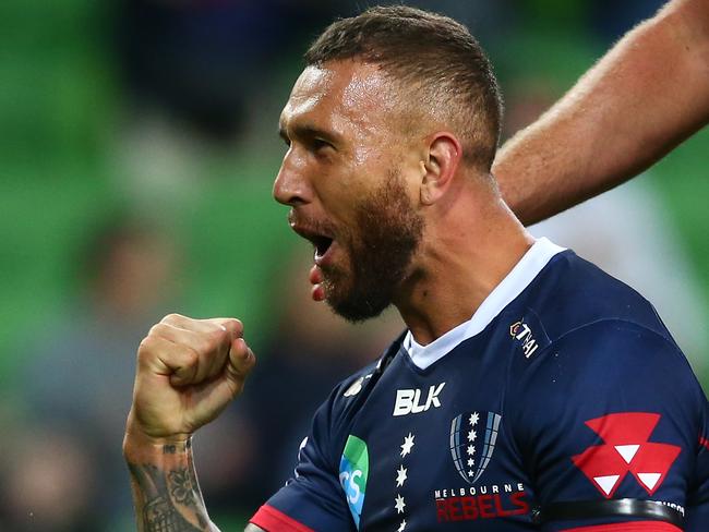 MELBOURNE, AUSTRALIA - APRIL 06: Quade Cooper of the Rebels celebrates after scoring a try during the round eight Super Rugby match between the Rebels and the Sunwolves at AAMI Park on April 06, 2019 in Melbourne, Australia. (Photo by Mike Owen/Getty Images for SUNWOLVES)