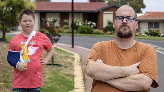 Jeremy Di Sessa with son Callum outside his Happy Valley home. Picture: Kelly Barnes