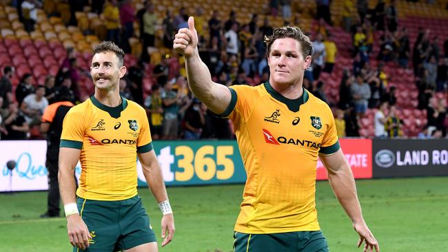 Michael Hooper (R) and Nic White celebrate the Wallabies victory over New Zealand on Saturday. Picture: Getty