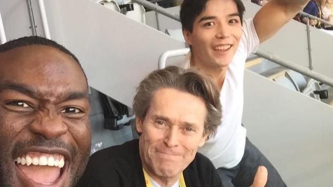 Yahya Abdul-Mateen II, Willem Dafoe and Ludi Lin at the Gold Coast Suns game at Metricon Stadium on the weekend.