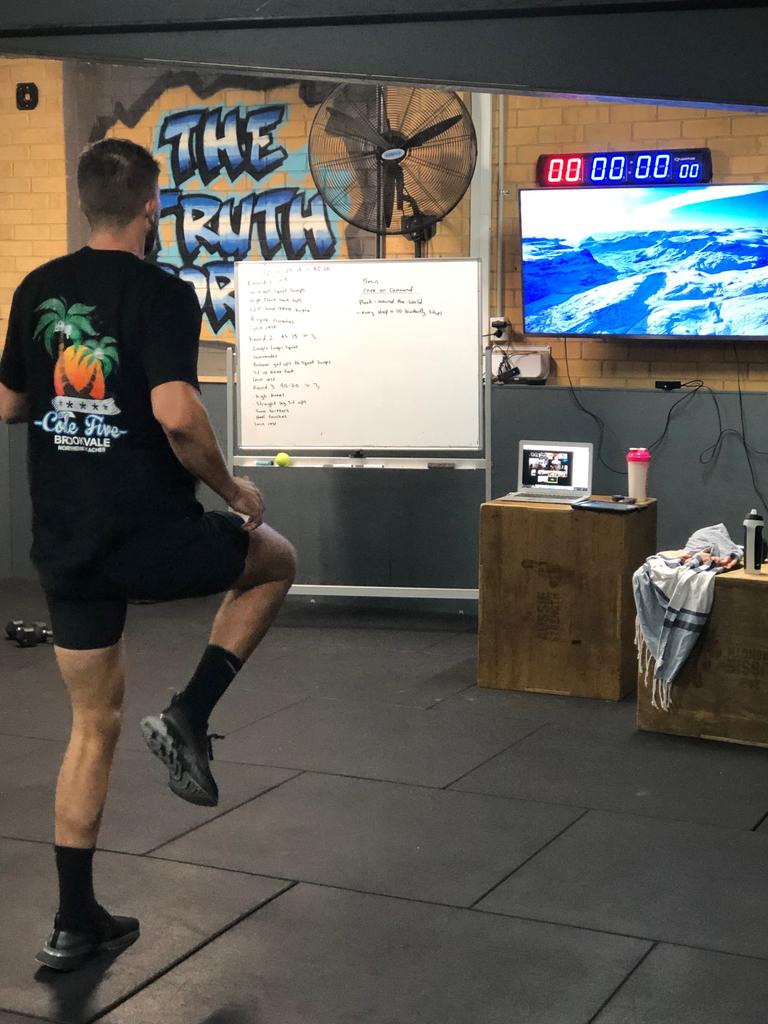 CODE 5 coach Daniel takes members through a live workout using Zoom.