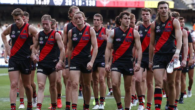 Disappointed Essendon players after the 11-goal loss to Geelong. Picture: Michael Klein