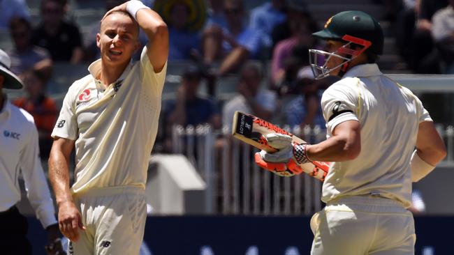 Tom Curran can’t believe his misfortune after his no-ball gave David Warner a reprieve on 99. Picture: AFP