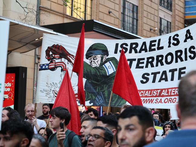 DAILY TELEGRAPH OCTOBER 9, 2023Pro-Palestine supporters are rallying at Sydney Town Hall as the conflict between Israel and Palestinians escalates. They marched form Town Hall to the Sydney Opera House. Picture: David Swift