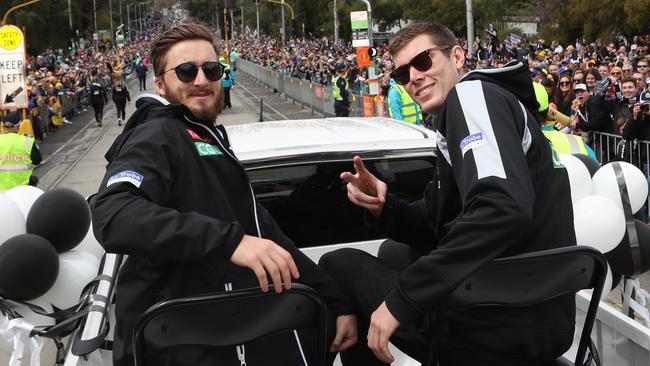 Tom Phillips and Mason Cox during the Grand Final parade. Picture: AAP