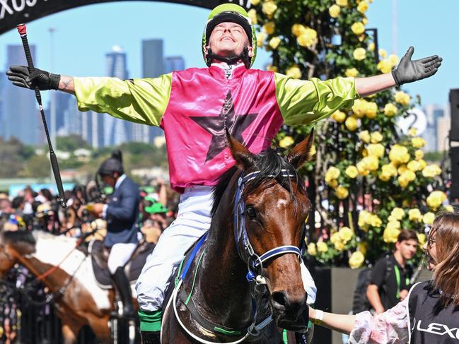 MELBOURNE, AUSTRALIA - NOVEMBER 05: Robbie Dolan riding Knight's Choice reacts after winning Race 7, the Lexus Melbourne Cup - Betting Odds during Melbourne Cup Day at Flemington Racecourse on November 05, 2024 in Melbourne, Australia. (Photo by Vince Caligiuri/Getty Images)