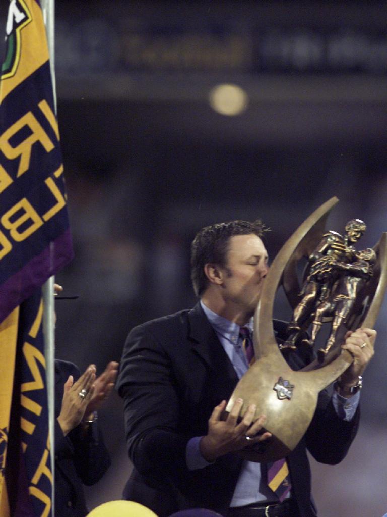 Storm great Glenn Lazarus kissed the NRL trophy pre-game.