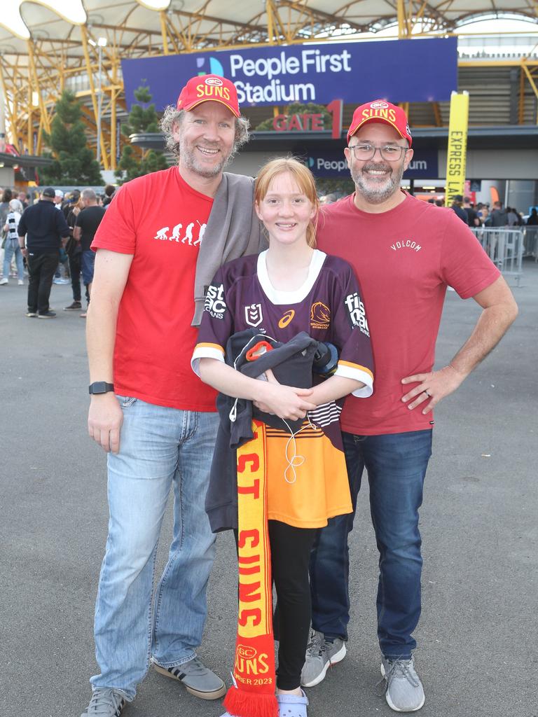 Gold Coast Suns vs. Collingwood. Scott Longmire, Evie Longmire and Jamie Azzopardi. 29 June 2024 Carrara Picture by Richard Gosling