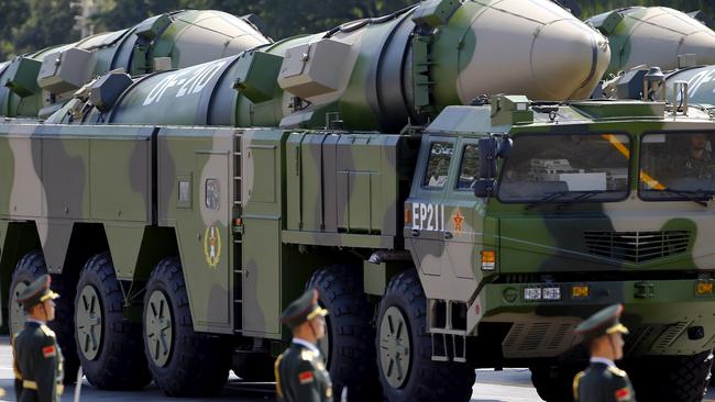 Military vehicles carrying DF-21D ballistic missiles roll to Tiananmen Square during a military parade. Picture: Reuters.