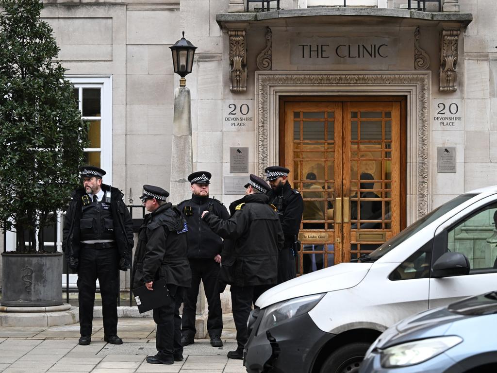 Police officers stand outside The London Clinic while the Princess of Wales recovers from abdominal surgery. (Photo by Leon Neal/Getty Images)