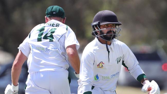 Bell Park batsmen Nikhil Pottabathini and Michael Lymer run between the wickets against Geelong City. Picture: Mark Wilson