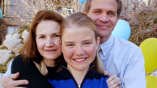 Stolen childhood: Elizabeth with her parents. Picture: AP