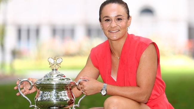 Ash Barty poses with the Daphne Akhurst Memorial Cup on Sunday. Picture: Getty Images