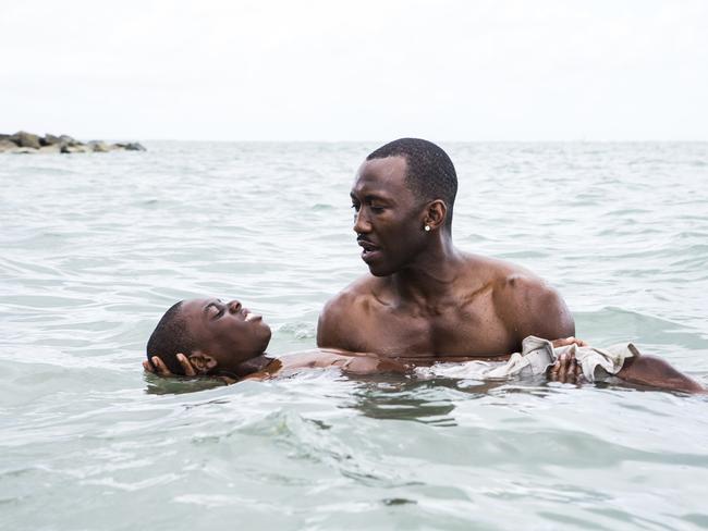 Mahershala Ali ‘s Juan teaches Chiron (Alex Hibbert) how to swim. Picture: David Bornfriend / A24 / AP