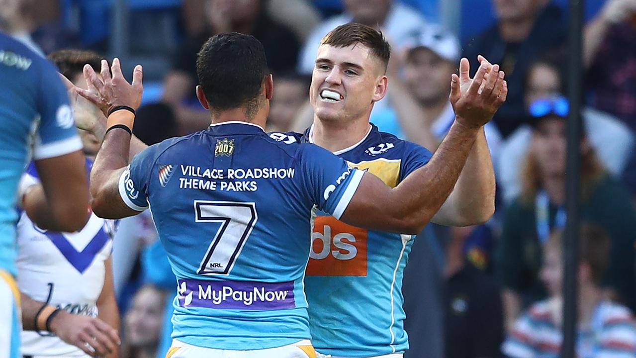 Alexander Brimson of the Titans celebrates a try.