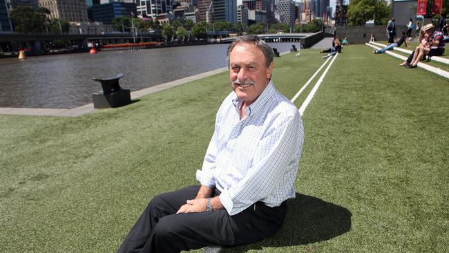 Tennis legend John Newcombe says he will proudly celebrate Australia Day on January 26 (AAP Image/David Crosling)