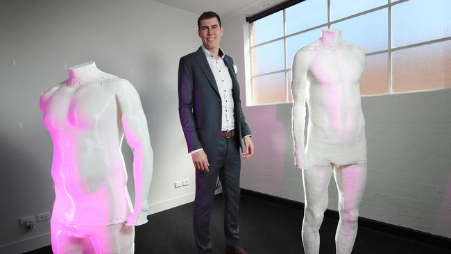 HOLD FOR THE HERALD SUN PIC DESK-----Mason Cox has tried first hand world-first 3D printing and scanning technology to have a suit custom tailored for his body. Created by two Aussie high school mates who grew tired of multiple fittings and ill-fitted suits, Tailors Mark is set to rid the industry of lengthy alterations and poorly fitted, expensive suits, getting the fit right the first time around.  Picture: Alex Coppel.