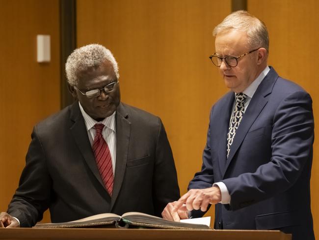 CANBERRA, AUSTRALIA - OCTOBER 06: Australian Prime Minister Anthony Albanese and Prime Minister of Solomon Islands, Manasseh Sogavare speak during their meeting on October 06, 2022 in Canberra, Australia. The Solomon Islands' Prime Minister Manasseh Sogavare visited Canberra against a backdrop of rising tensions in the Pacific, where China has made significant moves to extend its influence, including making a security deal with the Solomon Islands that has alarmed Australia and its allies. (Photo by Martin Ollman/Getty Images)