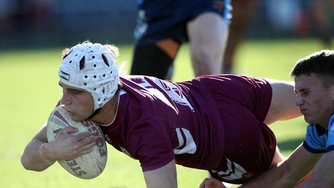 QLD's Jye Gray scores a try. Picture: Zak Simmonds