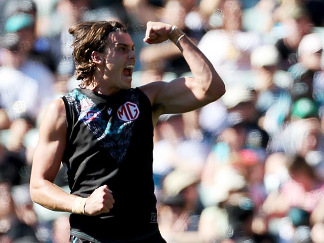 Lord celebrates his first goal in the AFL. (Photo by James Elsby/AFL Photos via Getty Images)