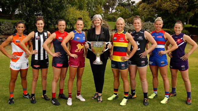2018 AFLW Cup Ambassador Sam Mostyn with the eight AFLW Captains.