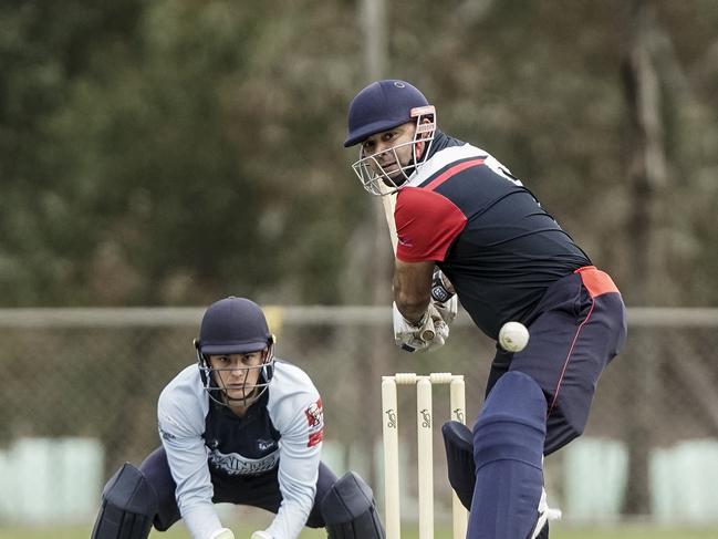 Haig Fawkner skipper Amit Chaudhary tees off against St Francis de Sales. Picture: Valeriu Campan