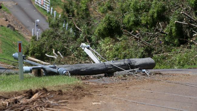 Fallen power lines and power poles are making the clean-up significantly more difficult. Picture: NCA NewsWire / Scott Powick