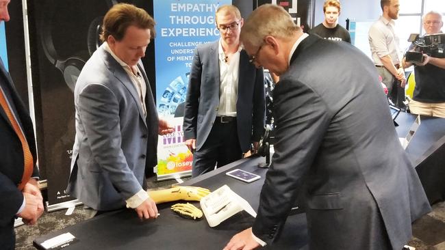  Dr Chris Jeffery explains the Field Micro Screw to Prince Andrew, Duke of York, at QUT in 2018.