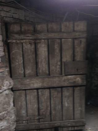 The original wooden door and brick walls underneath the Bush Inn. Photo: Don Smith.