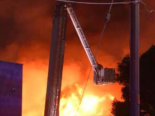 The blaze spread to a nearby building. Picture: Nine News